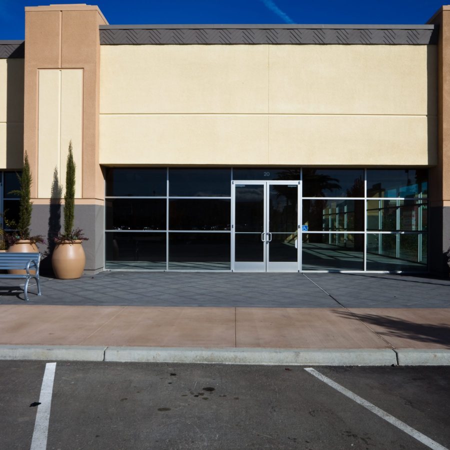 vacant vacant retail store in a strip mall.